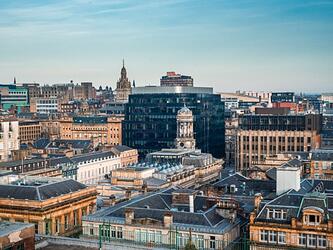 Rooftop view of architecture of old and new buildings in Glasgow, Scotland